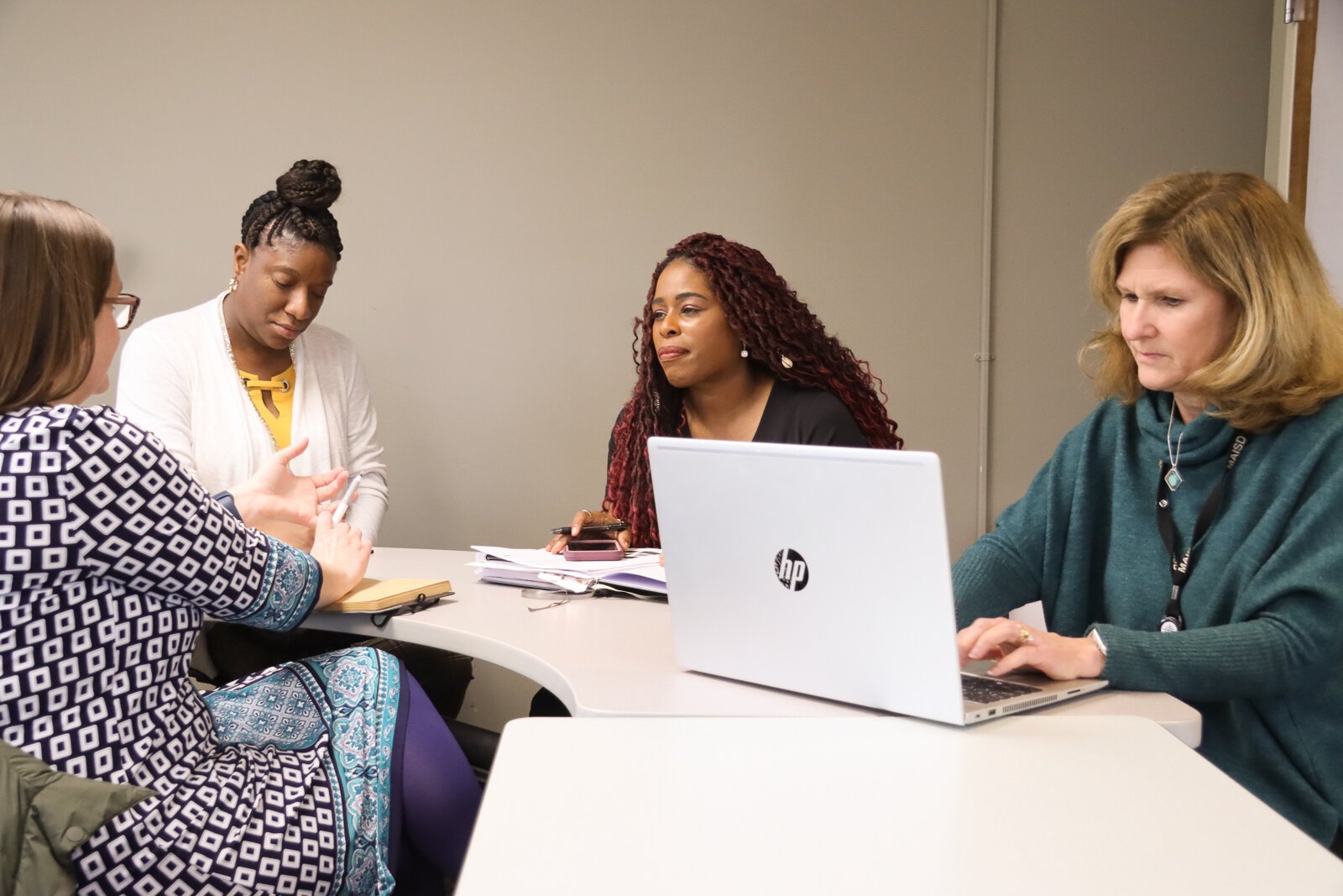 How YOU Birth Doula Services team members meet with members of their executive committee.