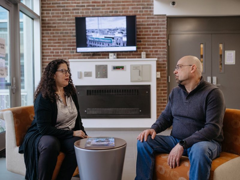 Elizabeth Agius, WSU School of Social Work associate director of research administration, with Larry West, Peers to Higher Education project manager.