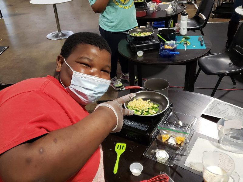 A young participant in The Learning Kitchen.