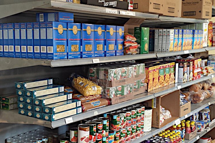 Caregiving Network and Helping Hands Mission help feed those in need.