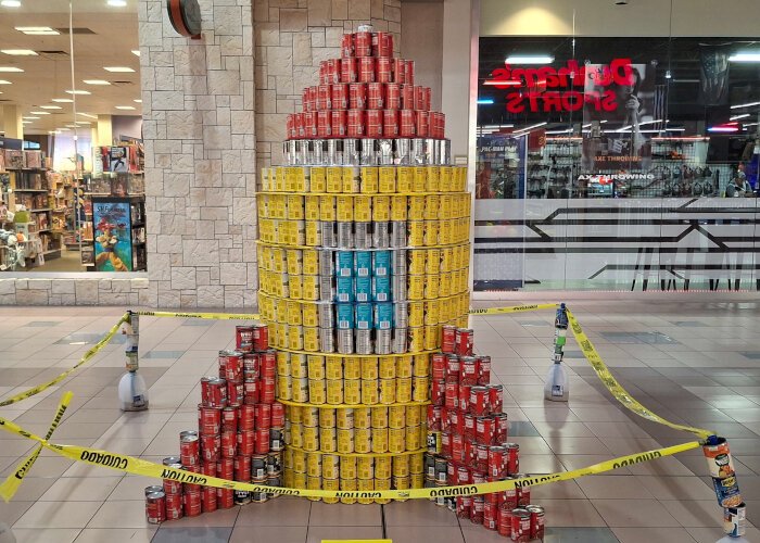 Midland Homeschool's "Rogue Robots" wins first place for Mission "Can" trol. The sculpture was created from over 2000 cans to aleviate area hunger.