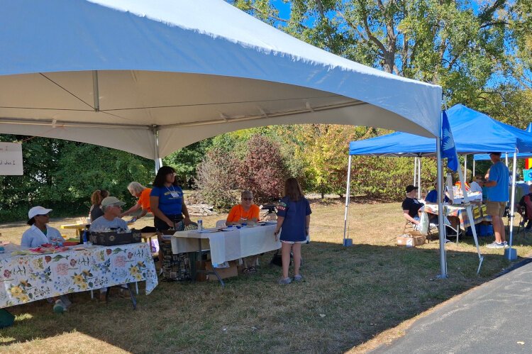 Visitors fill out Peace Passports to learn about organizations