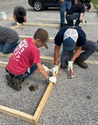 Starting at Square 1 camp teaches how to lay cement at Fisher Contracting