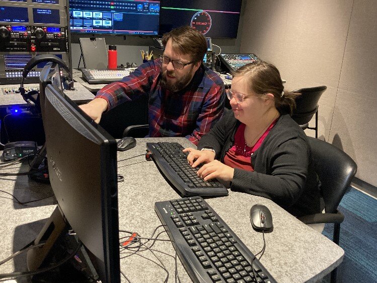 Kris Ferguson, MCTV Multimedia Production Specialist, with Amanda Brown, "3-2-1"  graphics operator/photographer