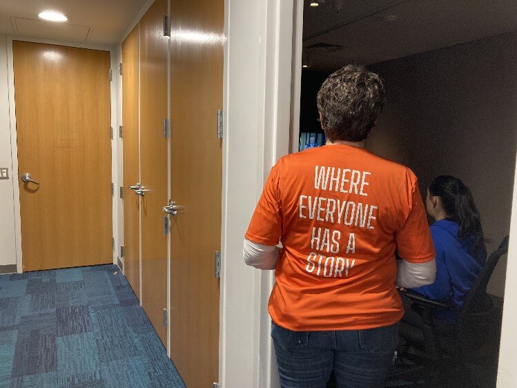 Susan Drumright donning the 3-2-1 shirts with the show's tagline on the back.