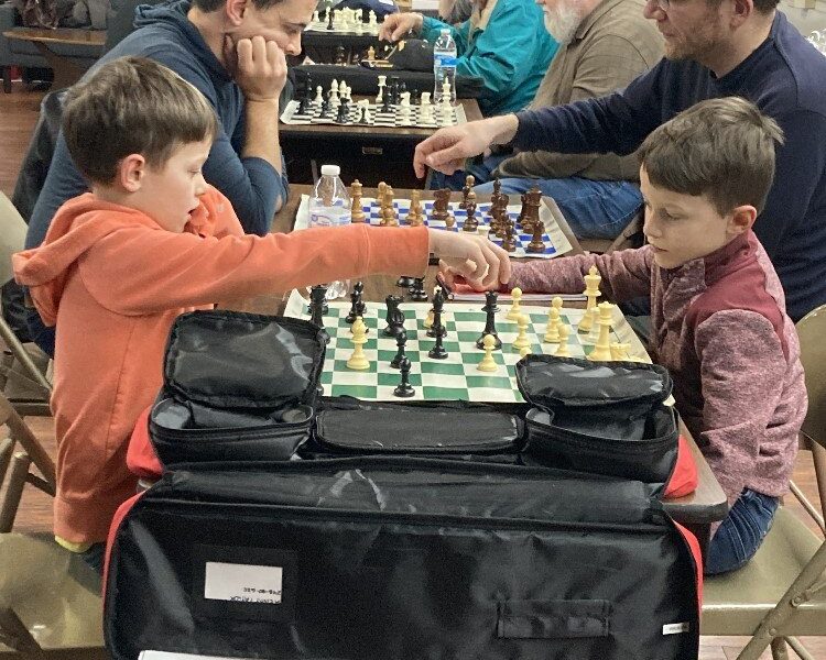 Two of the younger participants in the Midland Chess Club.