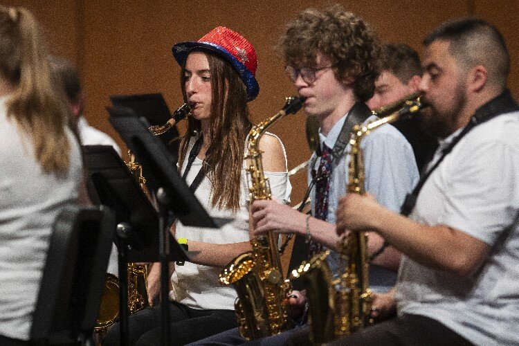 Cara Bucci, 16, left, is one of the band's younger members.