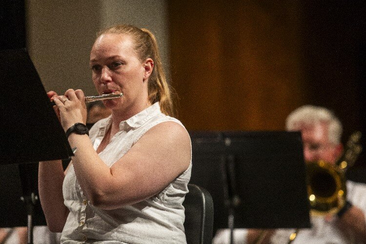 Mara Stewart plays flute.