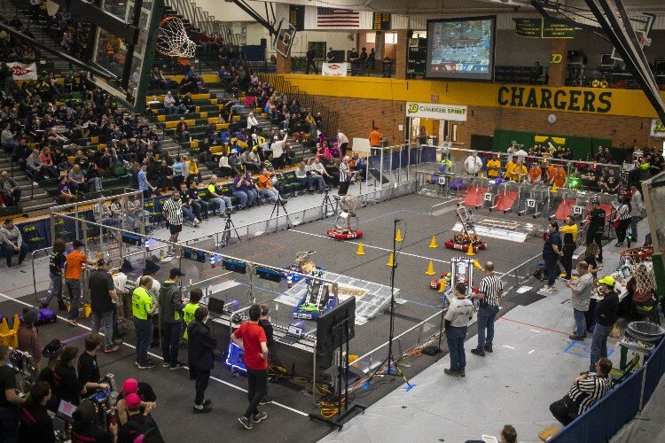 Teams compete in a match during the FIRST in Michigan District Midland Event presented by Dow on March 24 at Dow High School.