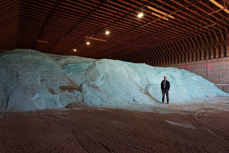 In an average year, 5000-6000 tons of salt is used. About 40% of that goes on county roads, and the other 60% is used on state (MDOT) routes. 