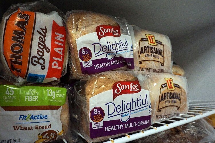 Frozen loaves of bread are available for clients to take what they need.