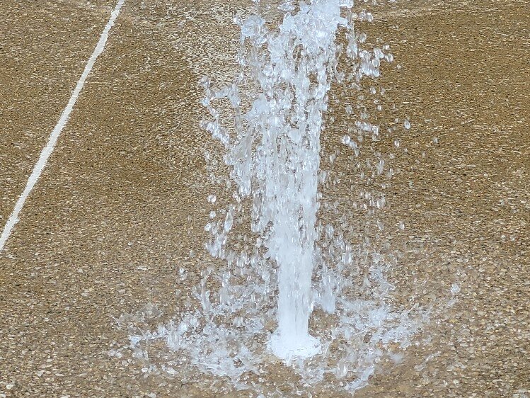 The spray parks are favorites of young children.