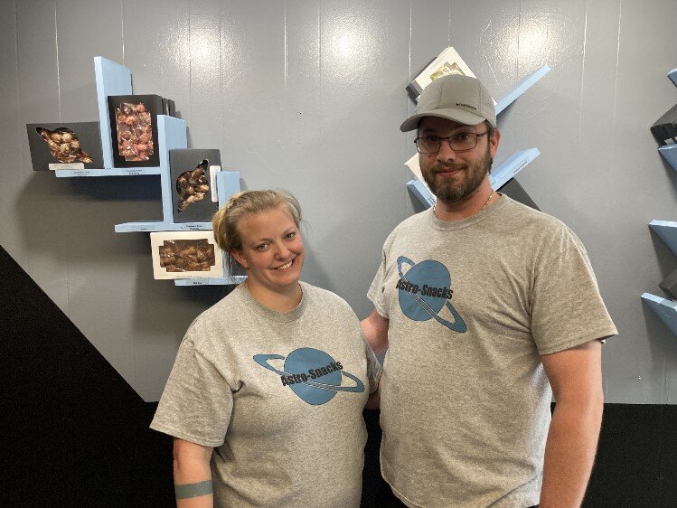 Stephanie and Andrew Eaves in the sales area of Astro-Snacks, 134 Ashman Circle.