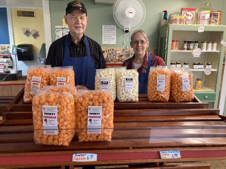 Gene and Patricia McFarland in the sales area of their shop, Pop-Pop’s Gourmet Popcorn.