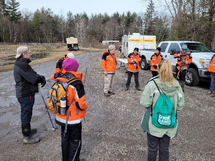 The Midland County Search and Rescue team gathers information before they begin their search.