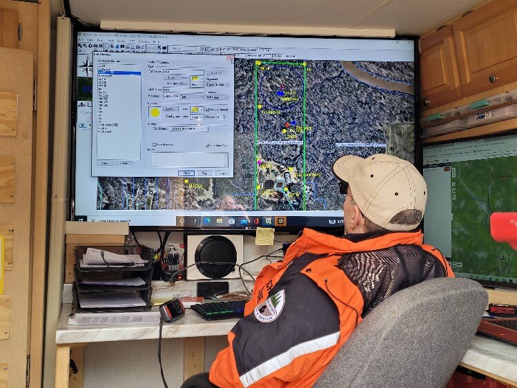 Mark Walker at his post inside the Search and Rescue trailer