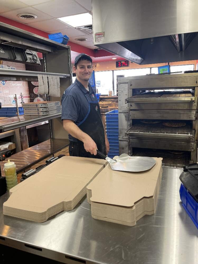 Midland General Manager Stanton McAtee ready to cut some pizzas.