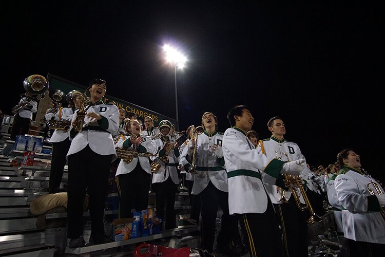 The H.H. Dow High band students celebrate their football team's victory over Midland High. (Crystal Gwizdala)