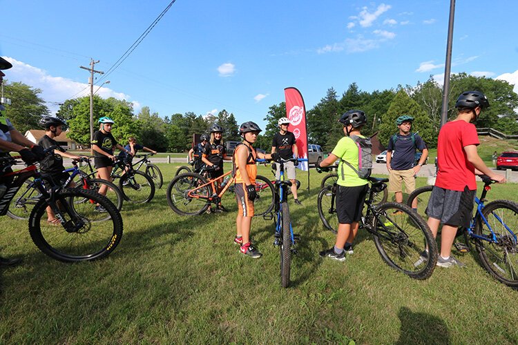 Groups form up with coaches and head out on the trails.