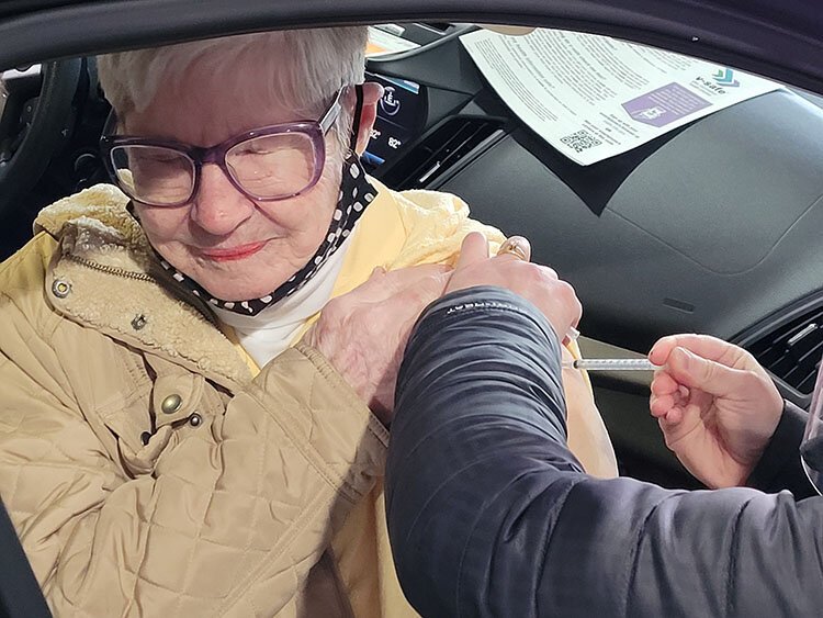 A wince is a common response when a vaccine recipient gets a shot in the arm. 