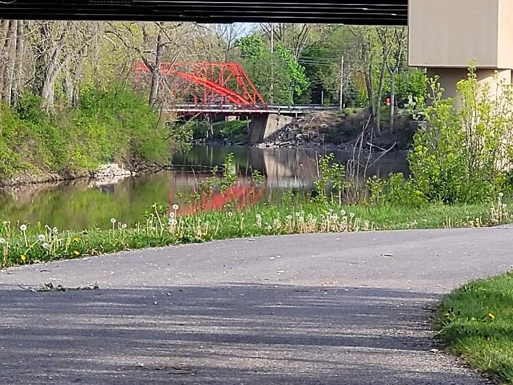 Pere Marquette Rail Trail passes by the Currie Parkway Bridge.