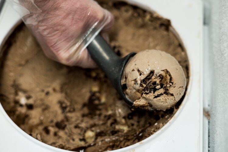 Each of their continually-evolving flavors of ice cream are made by hand. Pictured here is Pictured Rocks.
