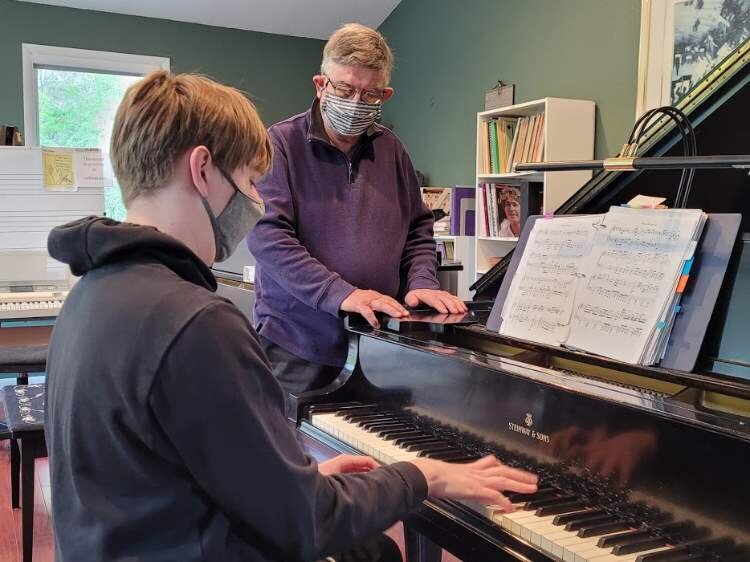 Jim Hohmeyer with piano student, Joseph Jackson