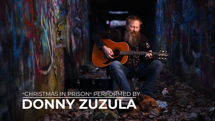 Donny Zuzula performs “Christmas in Prison,” by John Prine.