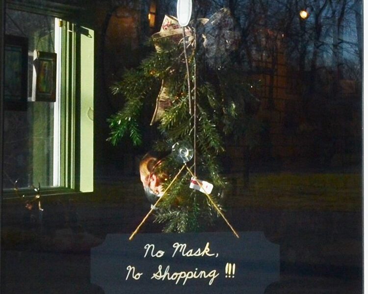 Door decorations at Nature Niche add a holiday touch to a safety notice.