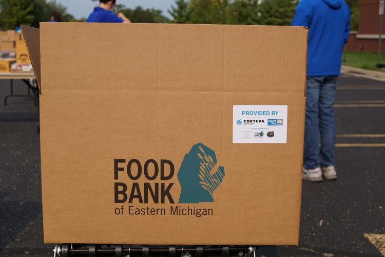 More than 100 Corteva employees helped on September 16 to pack 1,000 boxes of food.