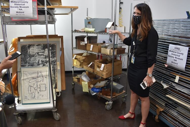 ART General Manager Mary Fisher-Smith with some of the art.