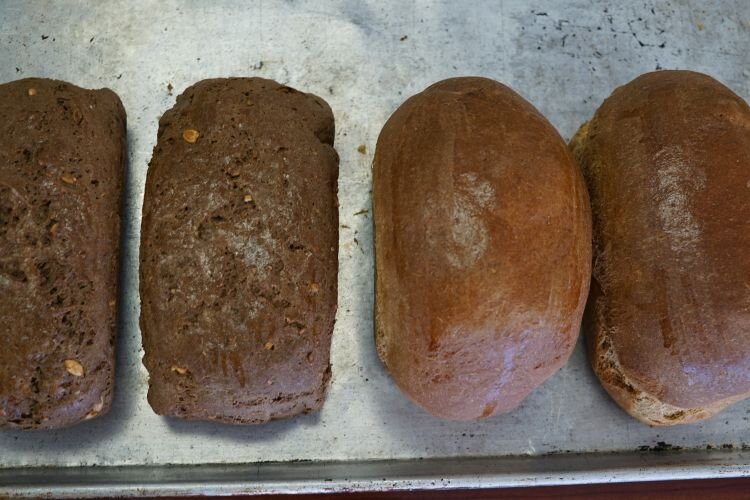 Some of Tony's bread, fresh baked and ready for slicing.