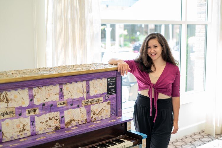 Gina Kearly by her piano at The H Hotel.