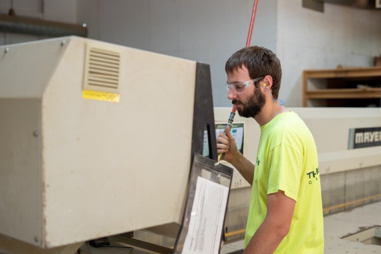 DJ Beebe working in the wood shop at TRC.