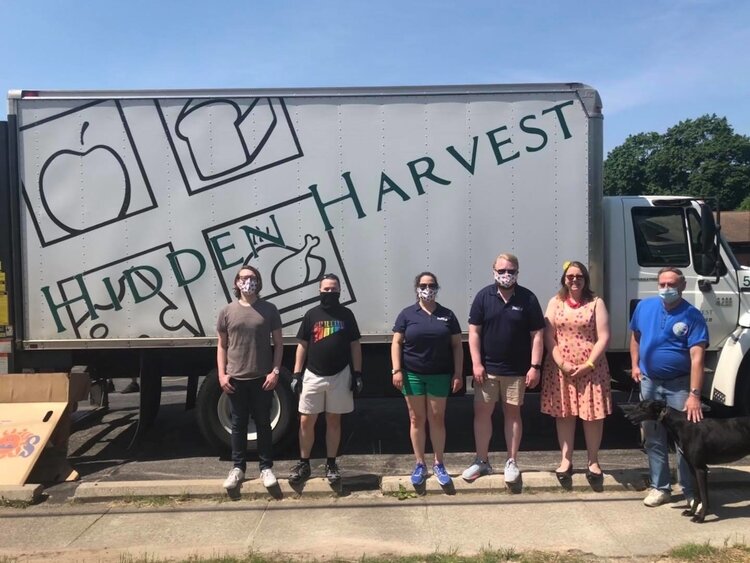 A group of volunteers at St. John’s Episcopal Church in Midland on June 20 along with Scott Ellis and Samantha McKenzie of Hidden Harvest.
