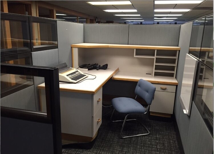 Before: A client's dark workspace before an overhaul with SPACE anew.