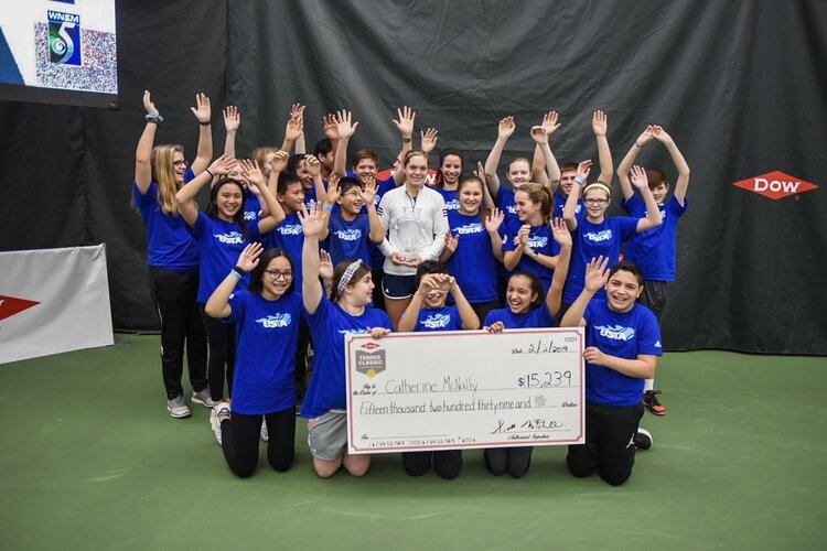 Ball runners with player Catherine McNally.