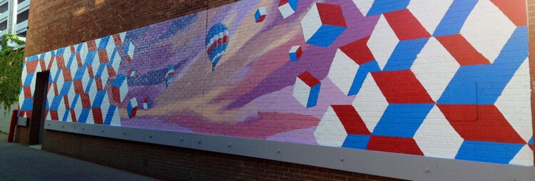 A mural by the Treetown Murals in Ann Arbor by husband and wife duo Mary Thiefels and Danijel Matanic (photo via Treetown Murals).