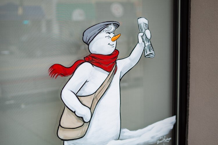 A paper delivery at the Midland Daily News.