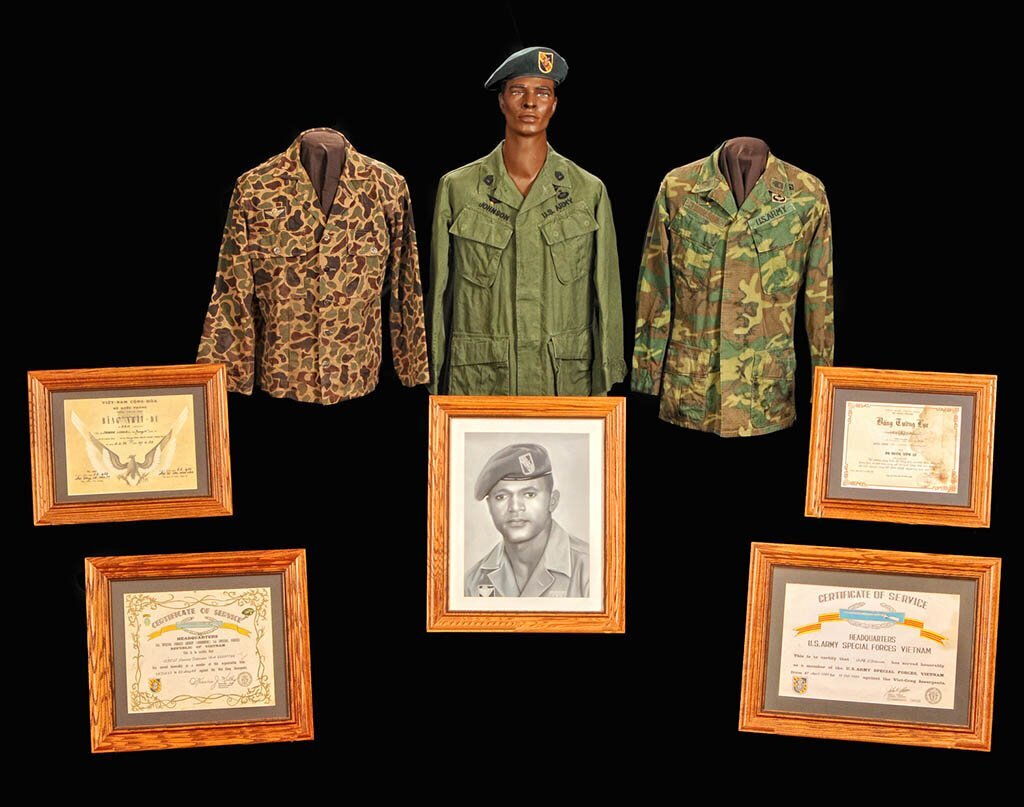 The Michigan Traveling Military Museum displays photographs, certificates, and uniforms that belonged to Command Sgt. Maj. Lonnie Johnson.