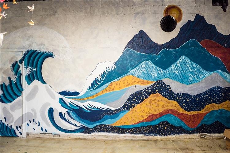 One of the murals inside Parker Lane Design Studio, which was created through a team effort.