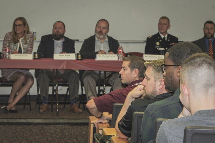 Students and staff at Central Michigan University attend a panel discussion with local cyber security experts on Oct. 11.