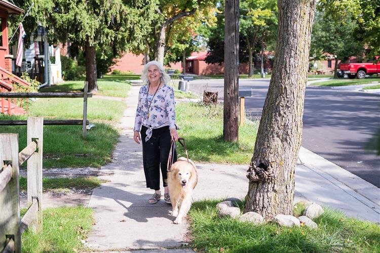 Cheryl Wade and her dog out for a walk in Midland.