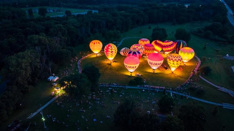 Balloons lit up at night during Riverdays and the Midland Balloon Festival.