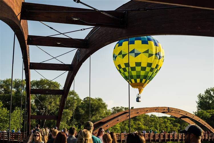 A balloon seen through the Tridge in Downtown Midland.