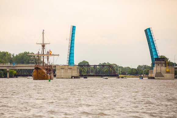 People lined both sides of the Saginaw River to greet the vessels as they arrived Thursday afternoon.