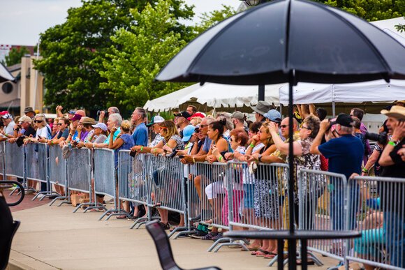 People waved, cheered, and took selfies as the ships arrived on Thursday afternoon.