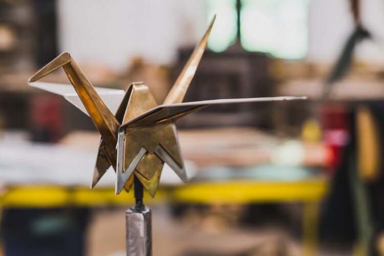 A mini replica of the crane recently installed in Grove Park in Midland.