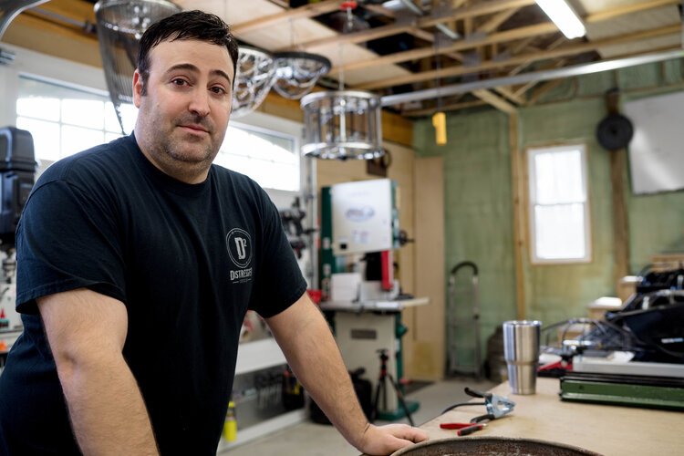 Anthony Acosta inside Distressed Design's studio.