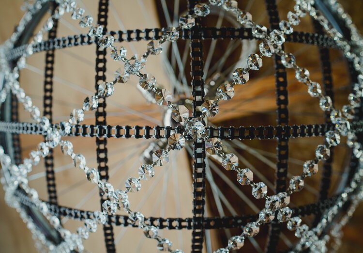 A close up of mixed materials on a chandelier.